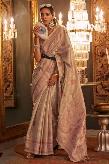 Glamorous Cream Color Weaving Designs Silk Saree 