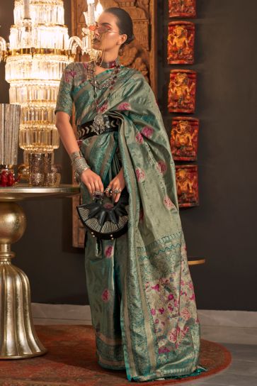 Phenomenal Weaving Designs Teal Color Silk Saree 