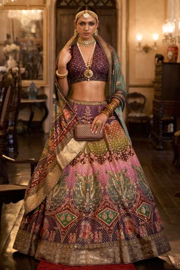 Graceful Wine Color Silk Lehenga with Intricate Mirror Detailing
