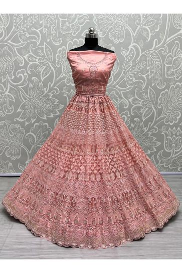 Wedding Look Pink Color Inventive Bridal Lehenga In Net Fabric