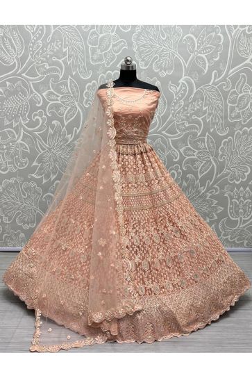 Net Fabric Wonderful Sequins Work Bridal Lehenga In Peach Color