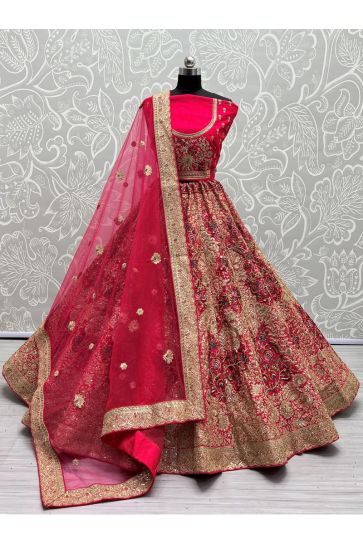Exquisite Silk Fabric Wedding Bridal Lehenga in Rani Color With Embroidered Work