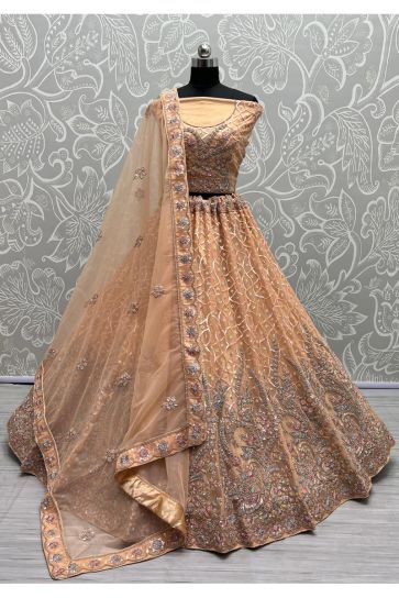 Heavy Embroidered Peach Color Bridal Look Fancy Lehenga Choli In Net Fabric