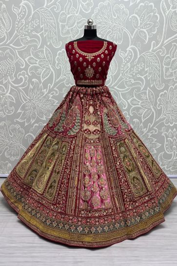 Embroidered Red Color Bridal Wear Lehenga In Velvet Fabric With Designer Unstitched Blouse