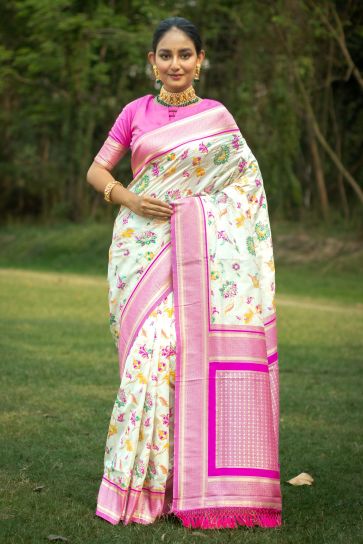 Attractive Off White Weaving Work Reach Banarasi Silk Traditional Saree
