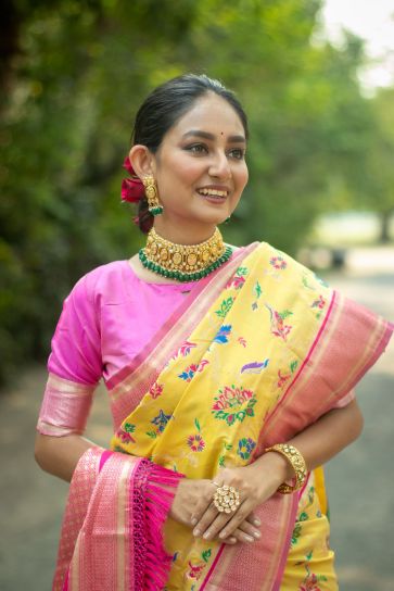 Delightful Yellow Weaving Work Reach Banarasi Silk Function Wear Saree