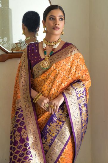 Delightful Orange Color Weaving Work Banarasi Silk Function Wear Saree