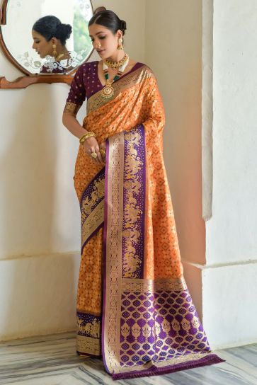 Delightful Orange Color Weaving Work Banarasi Silk Function Wear Saree