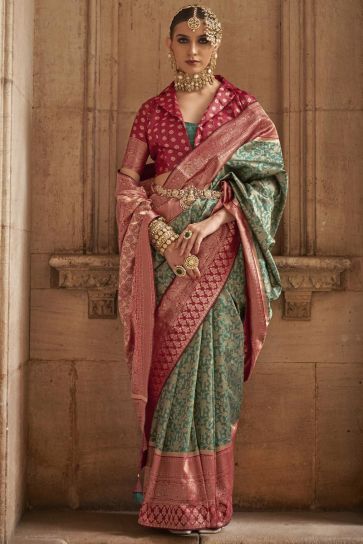 Dazzling Green Color Art Silk Fabric Weaving Work Function Wear Fancy Saree With Contrast Blouse
