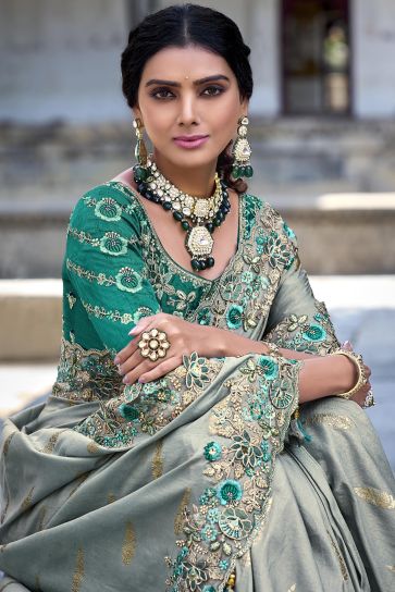 Marvelous Silk Sea Green Color Saree With Heavy Embroidered Blouse