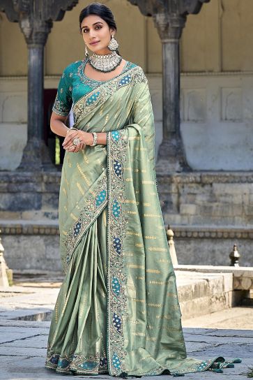 Classic Sea Green Color Silk Saree With Heavy Embroidered Blouse