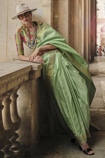 Art Silk Fabric Green Color Intricate Weaving Work Saree