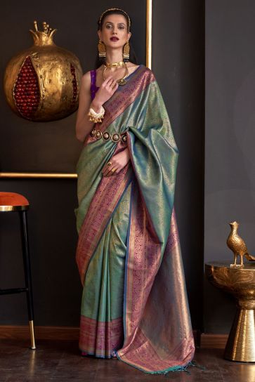 Tempting Art Silk Teal Color Weaving Work Saree