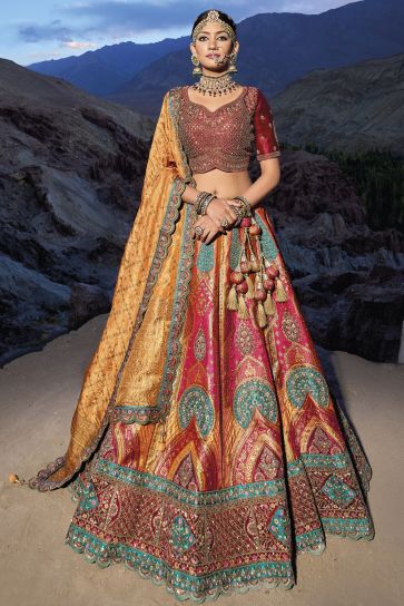 Fancy Work Designs Net Fabric Rani Color Wedding Wear Lehenga Choli