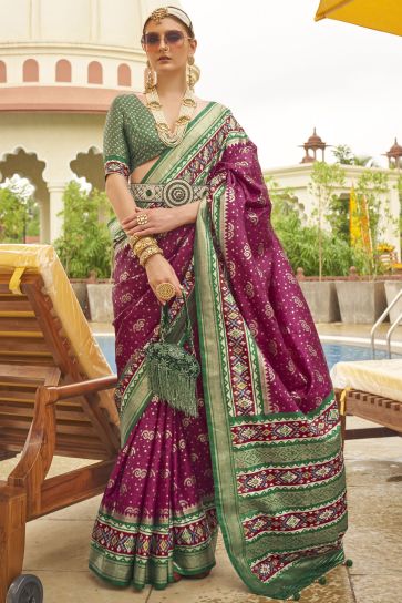 Attractive Purple Color Printed Patola Silk Fabric Saree