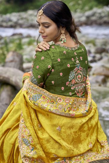 Engaging Yellow Color Fancy Silk Fabric Saree With Embroidered Work