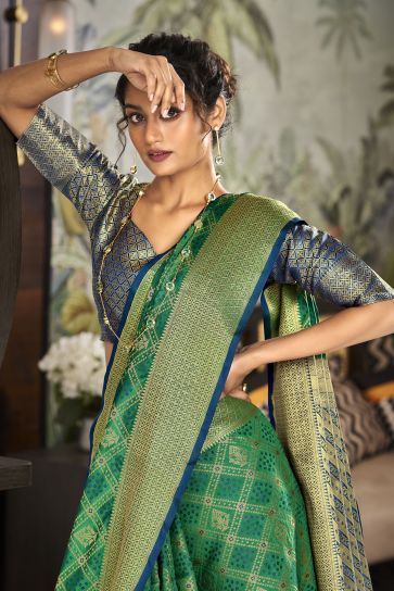 Weaving Designs On Awesome Festive Look Art Silk Saree In Green Color