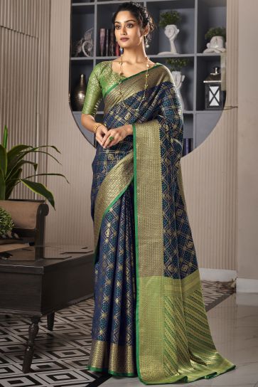 Appealing Weaving Designs On Festive Look Art Silk Saree In Navy Blue Color