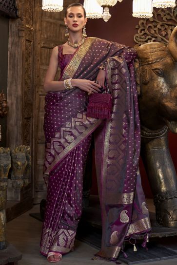 Beguiling Weaving Work On Wine Color Satin Silk Fabric Saree