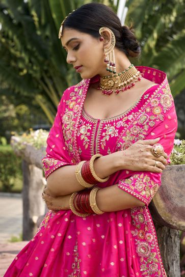 Jacquard Work On Banarasi Silk Fabric Bewitching Lehenga In Pink Color