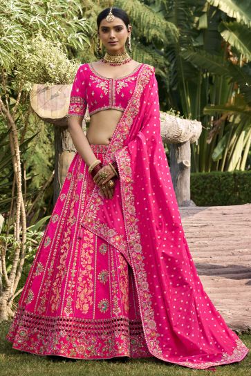 Jacquard Work On Banarasi Silk Fabric Bewitching Lehenga In Pink Color