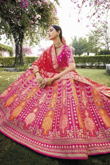 Banarasi Silk Fabric Multi Color Riveting Lehenga With Jacquard Work