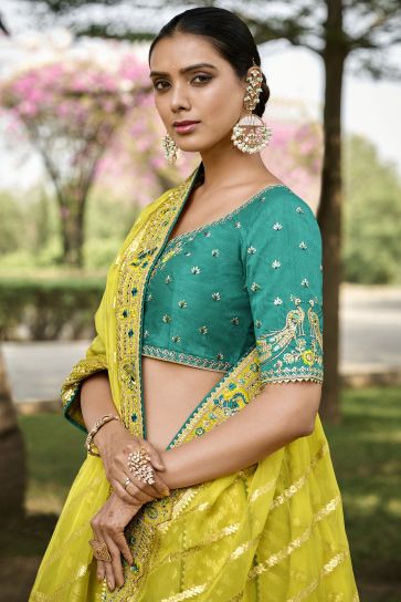 Jacquard Work On Yellow Color Sober Lehenga In Banarasi Silk Fabric