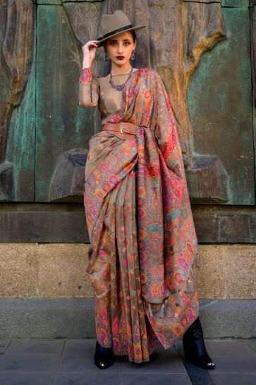 Dazzling Weaving Work On Brown Color Saree In Organza Fabric
