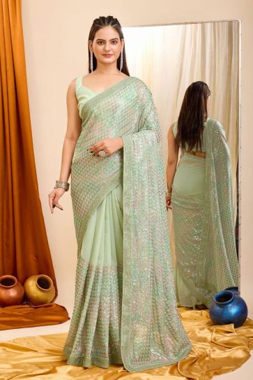 Attractive Georgette Fabric Sea Green Color Saree With Sequins Work