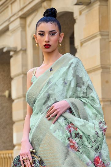 Soothing Printed Work On Sea Green Color Brasso Fabric Saree