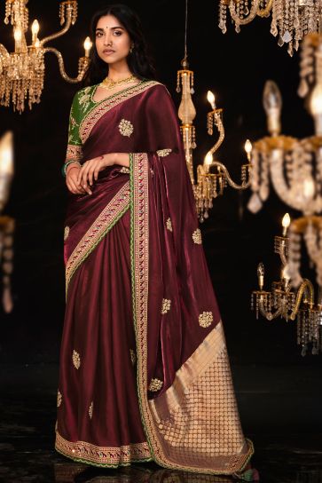 Embroidered Work On Tissue Fabric Bewitching Saree In Maroon Color