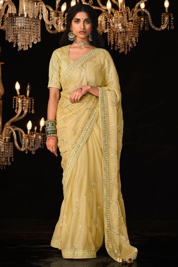 Embroidered Work On Yellow Color Sober Saree In Tissue Fabric