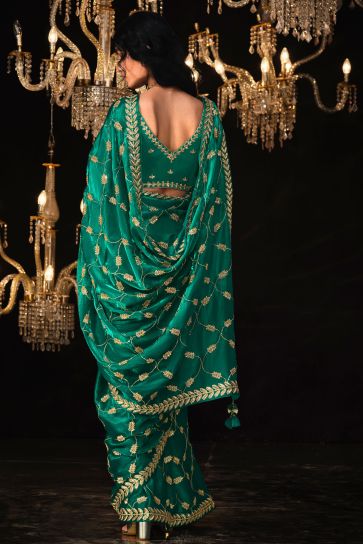 Excellent Tissue Fabric Sea Green Color Saree With Embroidered Work