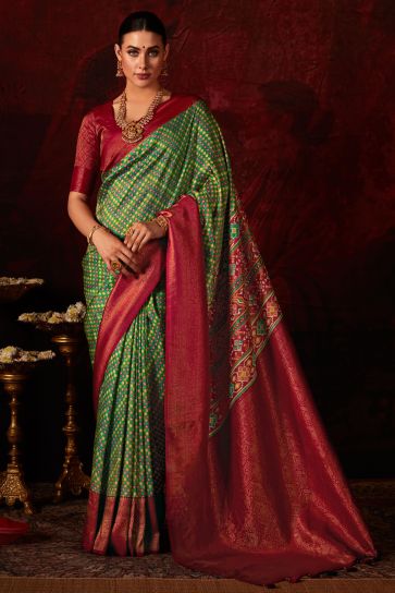 Attractive Patola Style Printed Silk Saree In Green Color