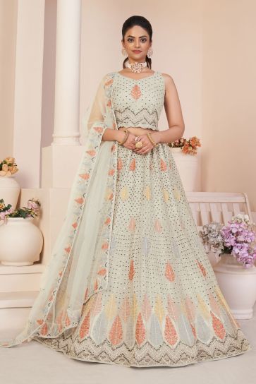 Off White Color Net Fabric Enticing Sequins Work Lehenga