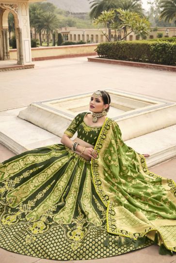Beautiful Dark Green Color Silk Fabric Embroidered Wedding Wear Lehenga Choli