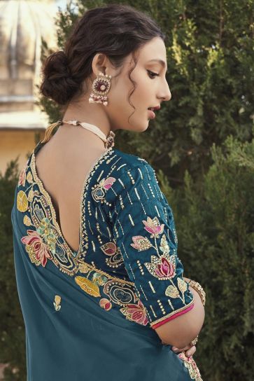 Silk Fabric Function Wear Luxurious Embroidered Saree In Teal Color