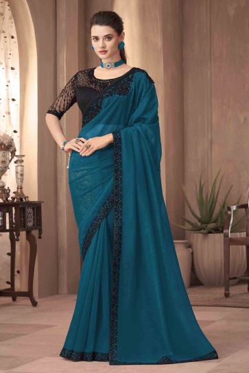 Wedding Wear Classic Blue Color Lace Border Work Saree In Silk Fabric