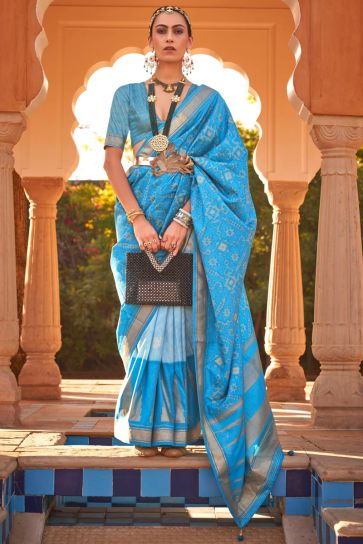 Printed Patola Silk Fabric Sky Blue Color Fancy Festive Wear Saree