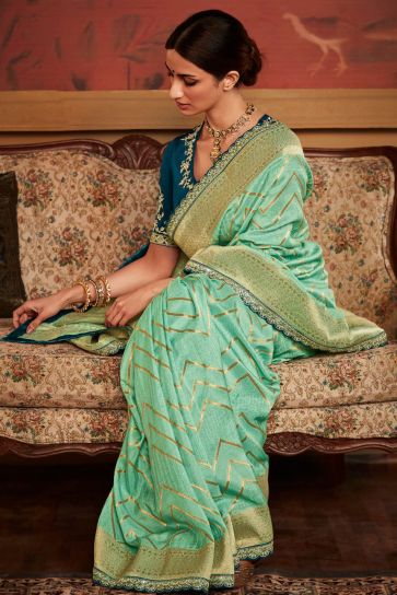 Dola Silk Fabric Weaving Work Sea Green Color Wedding Wear Designer Saree