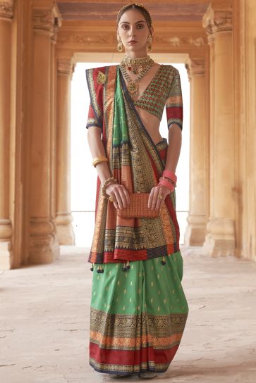 Kanjivaram Silk Fabric Weaving Print Green Color Wedding Wear Saree With Patola Design Blouse