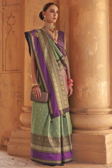 Sea Green Color Kanjivaram Silk Fabric Weaving Print Function Wear Fancy Saree With Patola Design Blouse