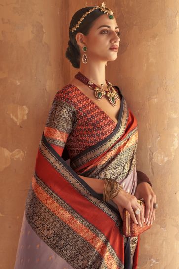 Lavender Color Kanjivaram Silk Fabric Weaving Print Festive Wear Fancy Saree With Patola Design Blouse