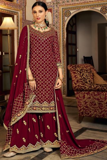 Party Wear Maroon Color Embroidered Palazzo Salwar Suit In Chinon Fabric