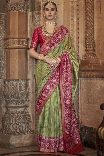 Eye Captivating Green Color Art Silk Fabric Printed Patola Saree