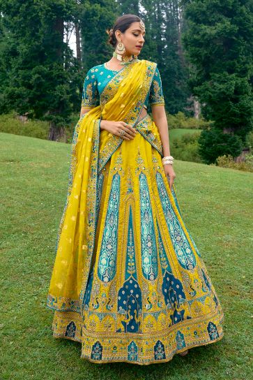 Silk Fabric Wedding Wear 3 Piece Lehenga Choli In Yellow Color With Embroidery Work