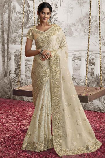 Classic Heavy Embroidery Work Beige Color Fancy Fabric Saree With Party Look Blouse