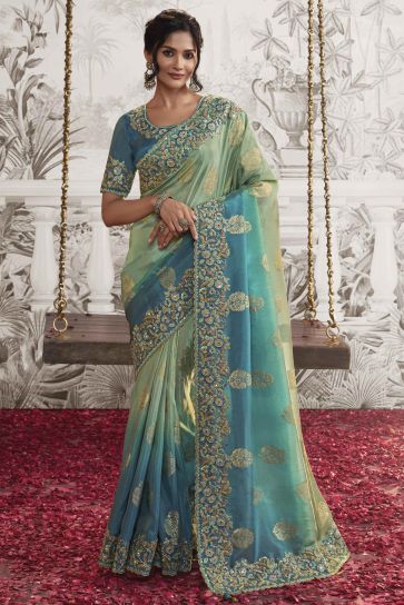 Blazing Sea Green Color Fancy Fabric Heavy Embroidery Work Saree With Party Look Blouse