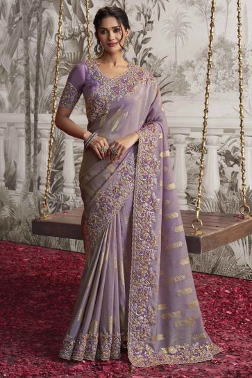 Radiant Lavender Color Heavy Embroidery Work Fancy Fabric Saree With Party Look Blouse