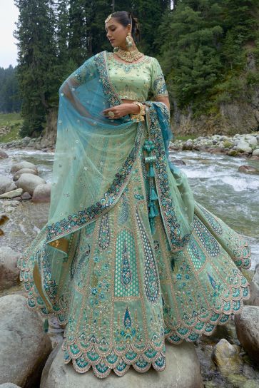 Embroidered Sea Green Color Bridal Lehenga In Viscose Fabric With Designer Choli